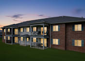 Thumbnail 51 of 77 - Exterior View In Night at CenterPointe Apartments & Townhomes, Canandaigua, NY