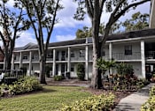 Thumbnail 23 of 25 - Exterior View at Fernwood Grove Apartments, Tampa, Florida