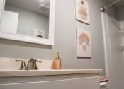 Thumbnail 11 of 61 - Renovated Bathroom at Highview Manor Apartments in Fairport, NY