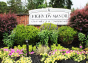 Thumbnail 57 of 61 - a sign for highview manor apartments and townhomes
