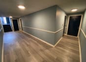 Thumbnail 44 of 54 - Renovated Hallway at  Lincoln Square Apartments at 4055 Knoll Drive in Hamburg, NY