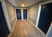 Thumbnail 40 of 54 - Renovated Hallway at  Lincoln Square Apartments at 4055 Knoll Drive in Hamburg, NY