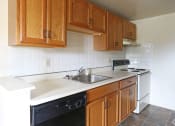 Thumbnail 23 of 54 - Classic Apartment Home Kitchen at Lincoln Square Apartments at 4055 Knoll Drive in Hamburg, NY