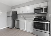 Thumbnail 4 of 46 - Modern Kitchen With Custom Cabinet at The Flats at Seminole Heights, Florida, 33603