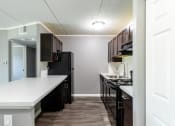 Thumbnail 30 of 111 - Renovated Kitchen at Woodland Ridge Apartments in Woodridge, IL