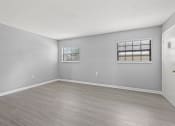 Thumbnail 10 of 46 - Renovated Apartment Home Living Room at The Flats at Seminole Heights, Tampa, FL
