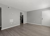 Thumbnail 8 of 46 - Vacant Living Room at The Flats at Seminole Heights, Tampa, FL, 33603