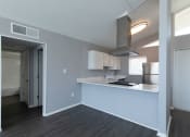 Thumbnail 11 of 47 - a kitchen and living room in a 555 waverly unit