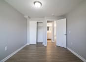 Thumbnail 70 of 103 - unfurnished bedroom with wooden flooring at Willowbrooke Apartments & Townhomes at 396 Willowbrooke Drive in Brockport, NY 14420