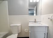 Thumbnail 69 of 103 - Bathroom with vanity and toilet area at Willowbrooke Apartments & Townhomes at 396 Willowbrooke Drive in Brockport, NY 14420