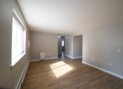Thumbnail 79 of 103 - Renovated Living Room with window at Willowbrooke Apartments & Townhomes at 396 Willowbrooke Drive in Brockport, NY 14420