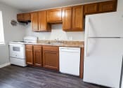 Thumbnail 30 of 103 - Kitchen with cabinets at Willowbrooke Apartments & Townhomes at 396 Willowbrooke Drive in Brockport, NY 14420