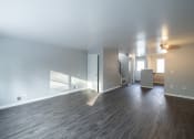 Thumbnail 9 of 103 - Renovated Living Room with wooden floor at Willowbrooke Apartments & Townhomes at 396 Willowbrooke Drive in Brockport, NY 14420