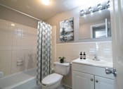 Thumbnail 3 of 103 - Updated Bathroom at Willowbrooke Apartments & Townhomes at 396 Willowbrooke Drive in Brockport, NY 14420