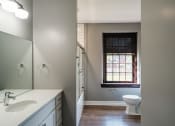 Thumbnail 15 of 23 - MODERN BATHROOM AT THE INGLESIDE APARTMENTS AT 70 HARVARD PLACE IN BUFFALO NY