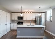 Thumbnail 2 of 23 - MODERN KITCHEN AT THE INGLESIDE APARTMENTS AT 70 HARVARD PLACE IN BUFFALO NY