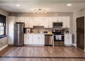 Thumbnail 3 of 23 - MODERN KITCHEN AT THE INGLESIDE APARTMENTS AT 70 HARVARD PLACE IN BUFFALO NY