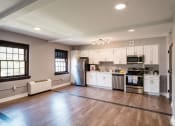 Thumbnail 5 of 23 - MODERN KITCHEN AT THE INGLESIDE APARTMENTS AT 70 HARVARD PLACE IN BUFFALO NY