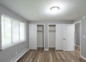 Thumbnail 2 of 15 - an empty room with a large window and a closet