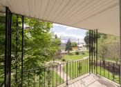 Thumbnail 11 of 15 - a view of the yard from the balcony of a house