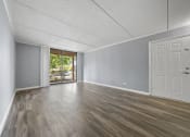 Thumbnail 39 of 111 - Area with wooden floors at Woodland Ridge Apartments in Woodridge, IL