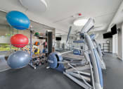 Thumbnail 97 of 111 - Fitness Center area at Woodland Ridge Apartments in Woodridge, IL