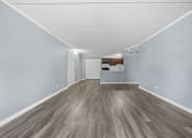 Thumbnail 33 of 111 - Wooden flooring Renovated Living Room at Woodland Ridge Apartments in Woodridge, IL
