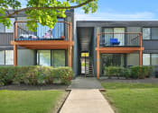 Thumbnail 108 of 111 - Exterior with greenery at Woodland Ridge Apartments in Woodridge, IL