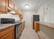 Thumbnail 69 of 111 - Upgraded Kitchen with wooden counter top at Woodland Ridge Apartments in Woodridge, IL