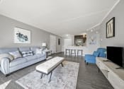 Thumbnail 19 of 111 - Renovated Living Room with decor at Woodland Ridge Apartments in Woodridge, IL