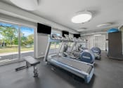 Thumbnail 98 of 111 - Fitness Center equipment at Woodland Ridge Apartments in Woodridge, IL