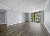 Thumbnail 38 of 111 - Renovated Living Room at Woodland Ridge Apartments in Woodridge, IL