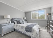 Thumbnail 21 of 111 - Renovated Bedroom with window view at Woodland Ridge Apartments in Woodridge, IL