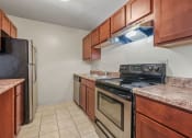 Thumbnail 73 of 111 - Upgraded Kitchen with wooden floor at Woodland Ridge Apartments in Woodridge, IL