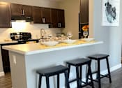 Thumbnail 3 of 111 - Kitchen at Woodland Ridge Apartments in Woodridge IL 60517