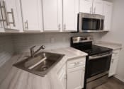 Thumbnail 7 of 54 - kitchen with stainless steal appliances