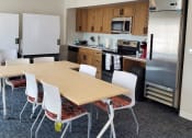 Thumbnail 4 of 10 - Community Room Kitchen