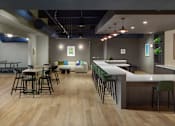 Thumbnail 37 of 54 - A modern bar with wooden floors and a long counter.