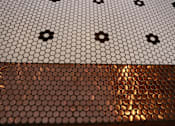 Thumbnail 7 of 32 - A close up of a metal surface with a hexagonal pattern.