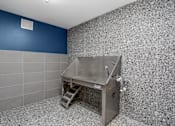 Thumbnail 85 of 87 - a bathroom with a sink and a urinal in it at Beekman on Broadway, Michigan, 48105