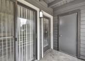 Thumbnail 33 of 41 - the front door of a home with a glass door and a glass screen door to