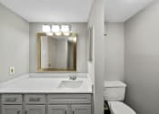 Thumbnail 35 of 37 - a bathroom with a sink toilet and mirror