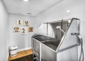 Thumbnail 13 of 41 - a small bathroom with a shower and a sink