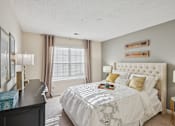 Thumbnail 3 of 32 - Bedroom with bed at Radbourne Lake Apartments, Charlotte
