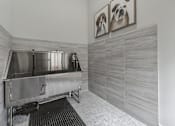 Thumbnail 11 of 29 - A stainless steel sink in a modern bathroom.