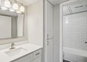 Thumbnail 20 of 31 - White Bathroom with mirror at Keller Oaks, Carrollton, Texas
