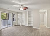 Thumbnail 4 of 32 - Room with glass doors at Radbourne Lake Apartments, Charlotte, 28269
