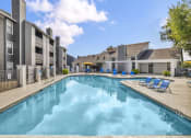 Thumbnail 3 of 41 - our apartments have a resort style pool with lounge chairs