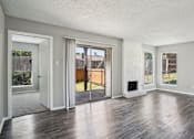 Thumbnail 12 of 31 - Room with wooden floor at Keller Oaks, Carrollton, TX