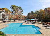 Thumbnail 21 of 32 - Shimmering pool at Radbourne Lake Apartments, North Carolina